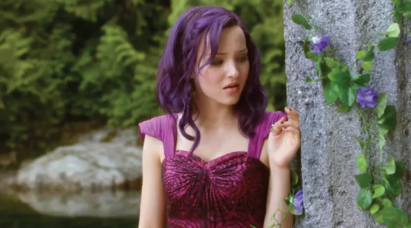 Dove Cameron in a scene of the movie descendants with hair dyed in purple Dove Cameron in a scene of the movie descendants with hair dyed in purple