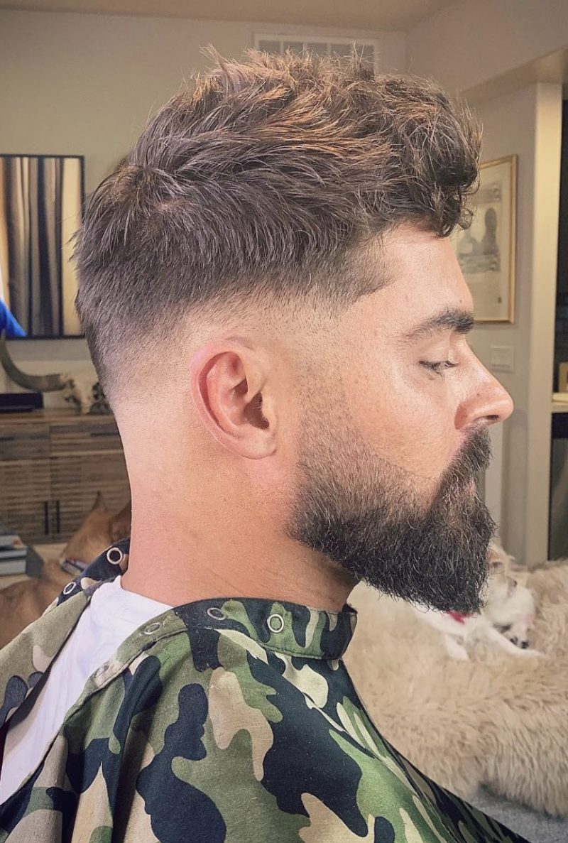 Zac Efron profile with daper fade haircut Zac Efron profile with daper fade haircut
